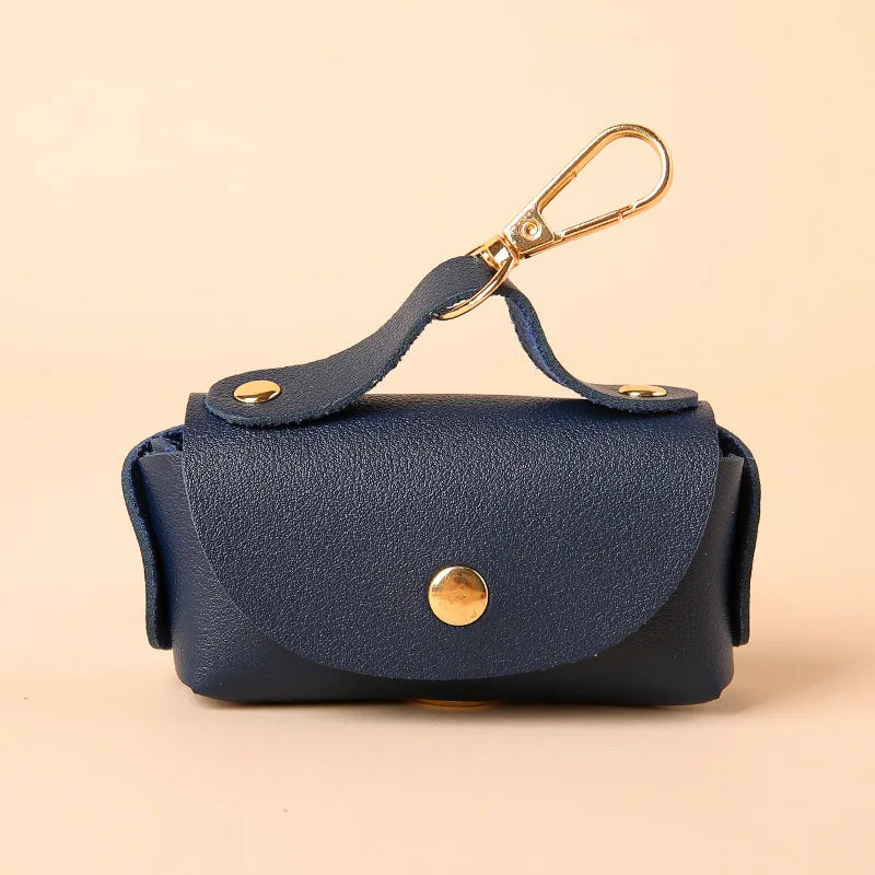 Portable Dog Waste Bag Dispenser – Durable Polyester Poop Bag Holder with Convenient Leather Clip for Easy Outdoor Walks.