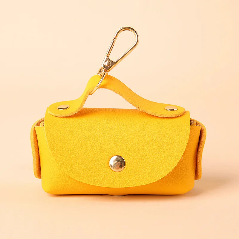 Portable Dog Waste Bag Dispenser – Durable Polyester Poop Bag Holder with Convenient Leather Clip for Easy Outdoor Walks.