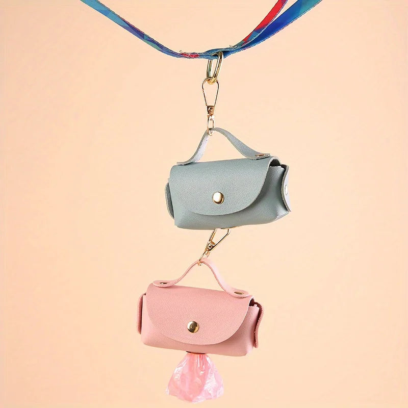 Portable Dog Waste Bag Dispenser – Durable Polyester Poop Bag Holder with Convenient Leather Clip for Easy Outdoor Walks.