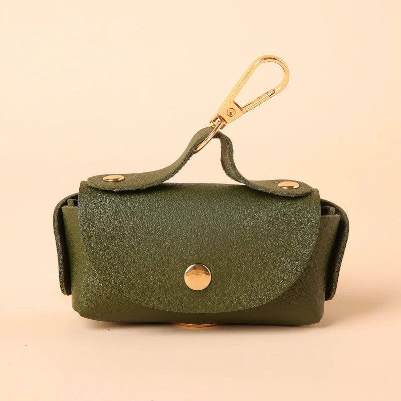 Portable Dog Waste Bag Dispenser – Durable Polyester Poop Bag Holder with Convenient Leather Clip for Easy Outdoor Walks.