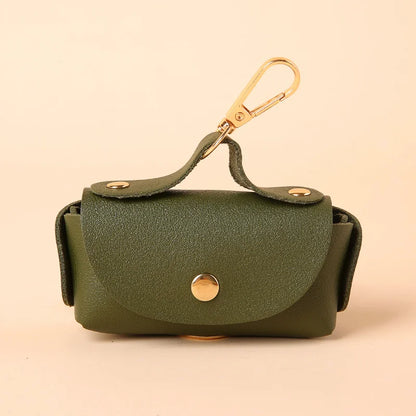 Portable Dog Waste Bag Dispenser – Durable Polyester Poop Bag Holder with Convenient Leather Clip for Easy Outdoor Walks.